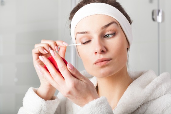 Girl Making Up Her Eye Lashes