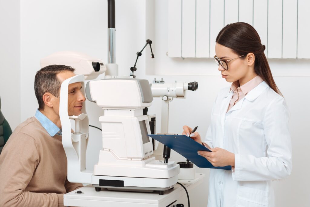Doctor Inspecting Eye Of A Patient