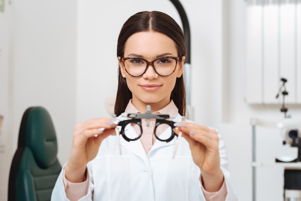Doctor Inspecting Eye Of A Patient